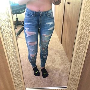 Midrise heavily distressed KanCans